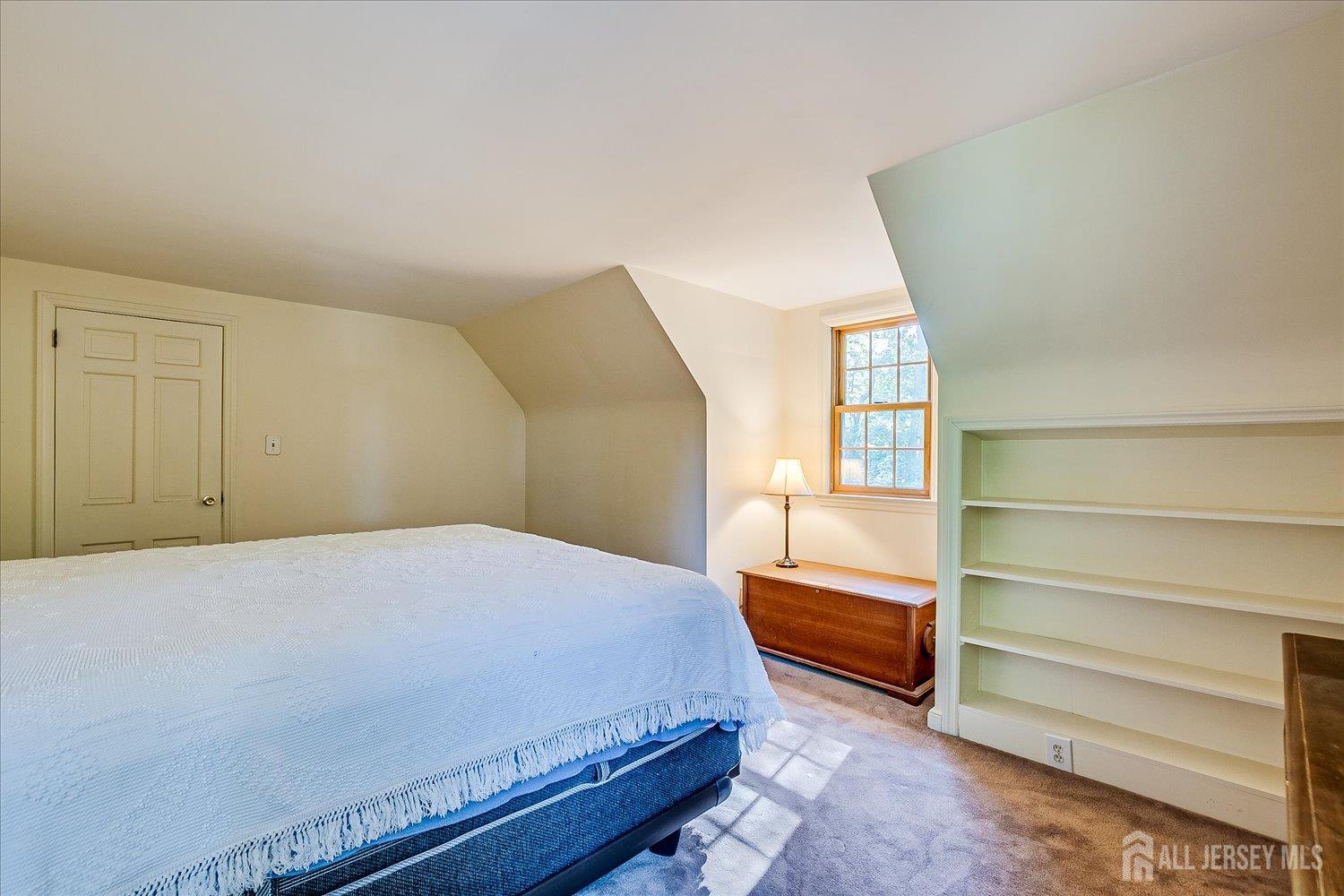 39 Rayle Court Metuchen, NJ 08840 - Photo 20 of 29 a bedroom with a bed and cabinets