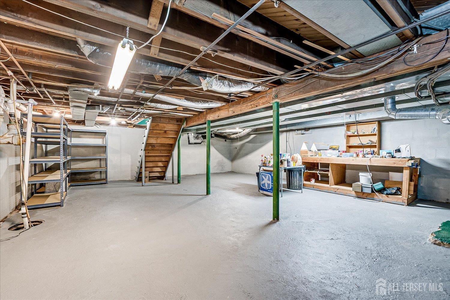39 Rayle Court Metuchen, NJ 08840 - Photo 26 of 29 a view of a storage room with racks