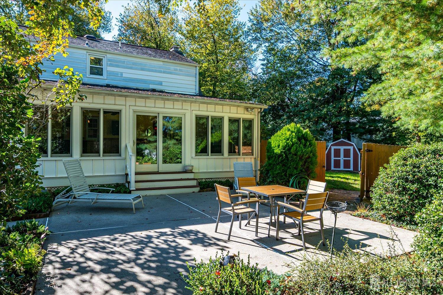 39 Rayle Court Metuchen, NJ 08840 - Photo 28 of 29 a view of a house with backyard sitting area and garden