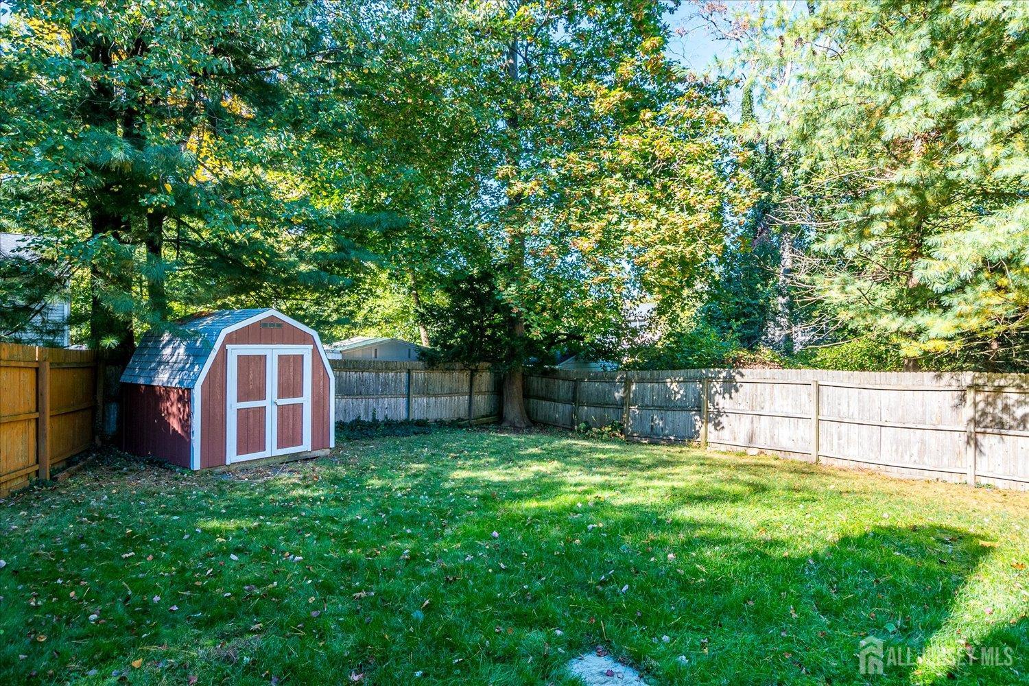 39 Rayle Court Metuchen, NJ 08840 - Photo 29 of 29 a view of a house with a yard and large trees