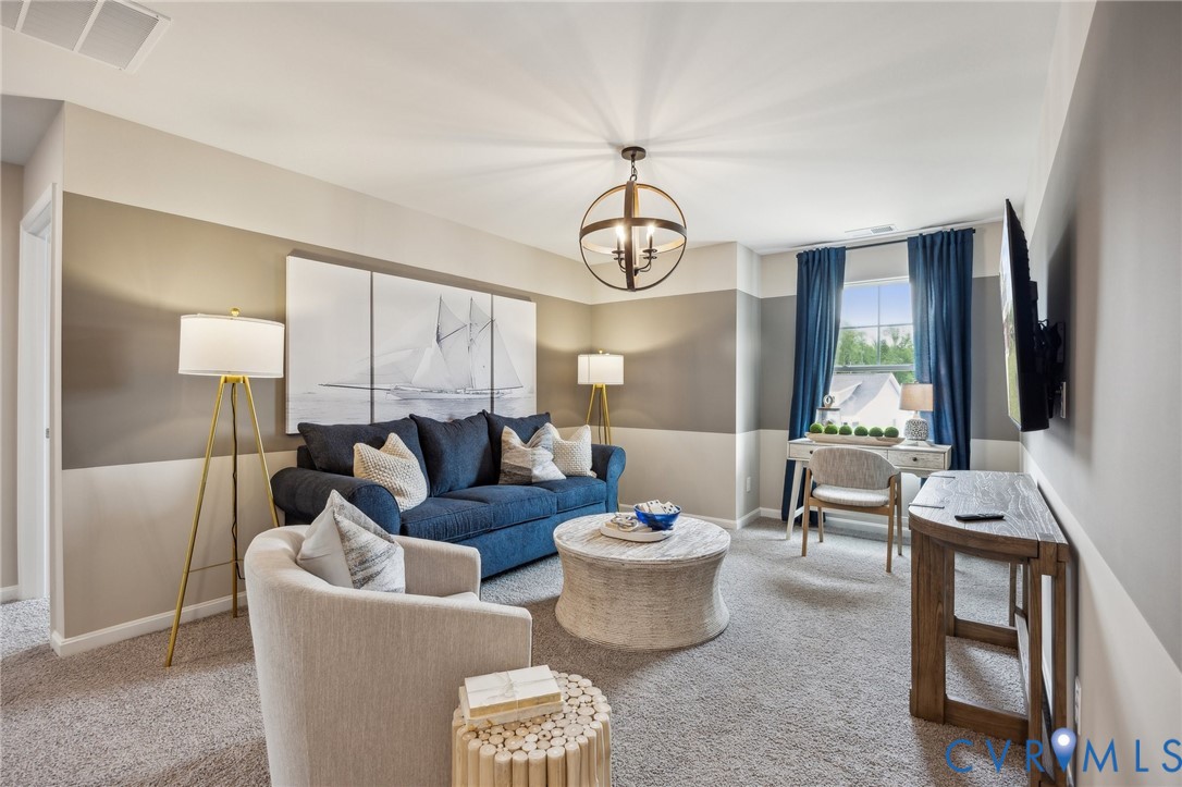 211 Happy Valley Road Keswick, VA 22947 - Photo 15 of 31 a living room with furniture and a large window