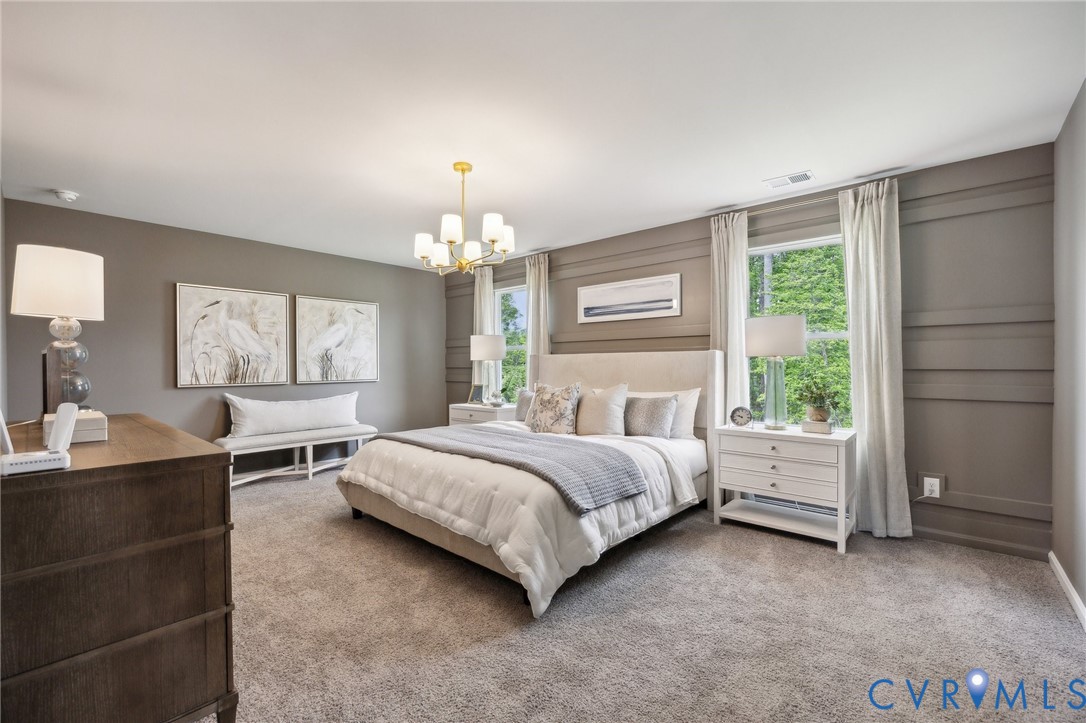 211 Happy Valley Road Keswick, VA 22947 - Photo 25 of 31 a spacious bedroom with a bed and window