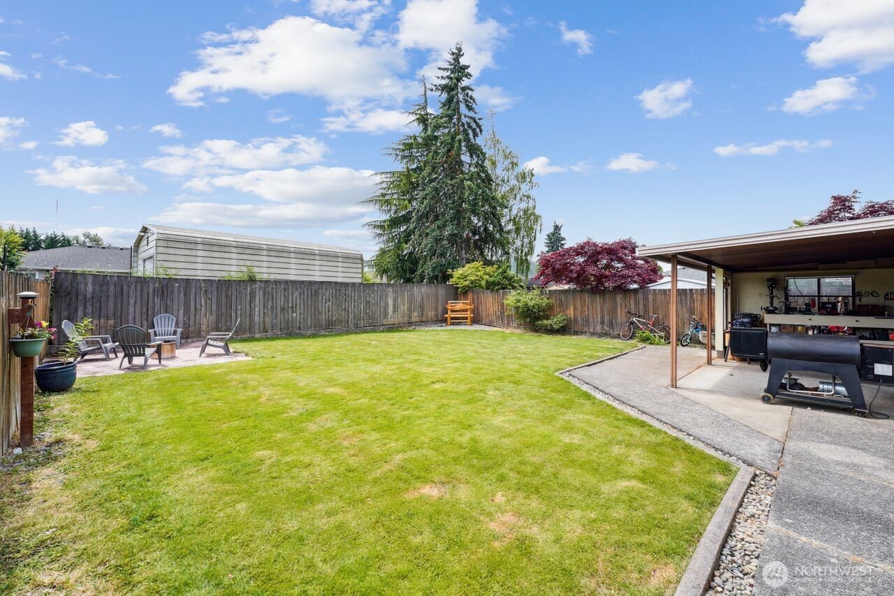 3381 Nebraska Street Longview, WA 98632 - Photo 23 of 25 a swimming pool with outdoor seating and yard