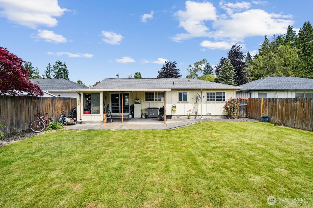 3381 Nebraska Street Longview, WA 98632 - Photo 24 of 25 a view of a house with swimming pool and porch with furniture