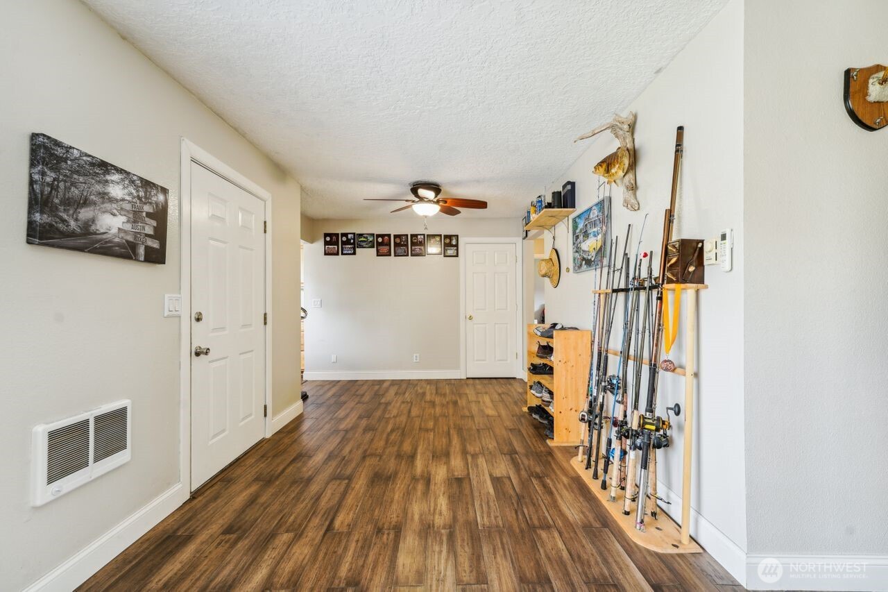 3381 Nebraska Street Longview, WA 98632 - Photo 3 of 25 a view of empty room with wooden floor
