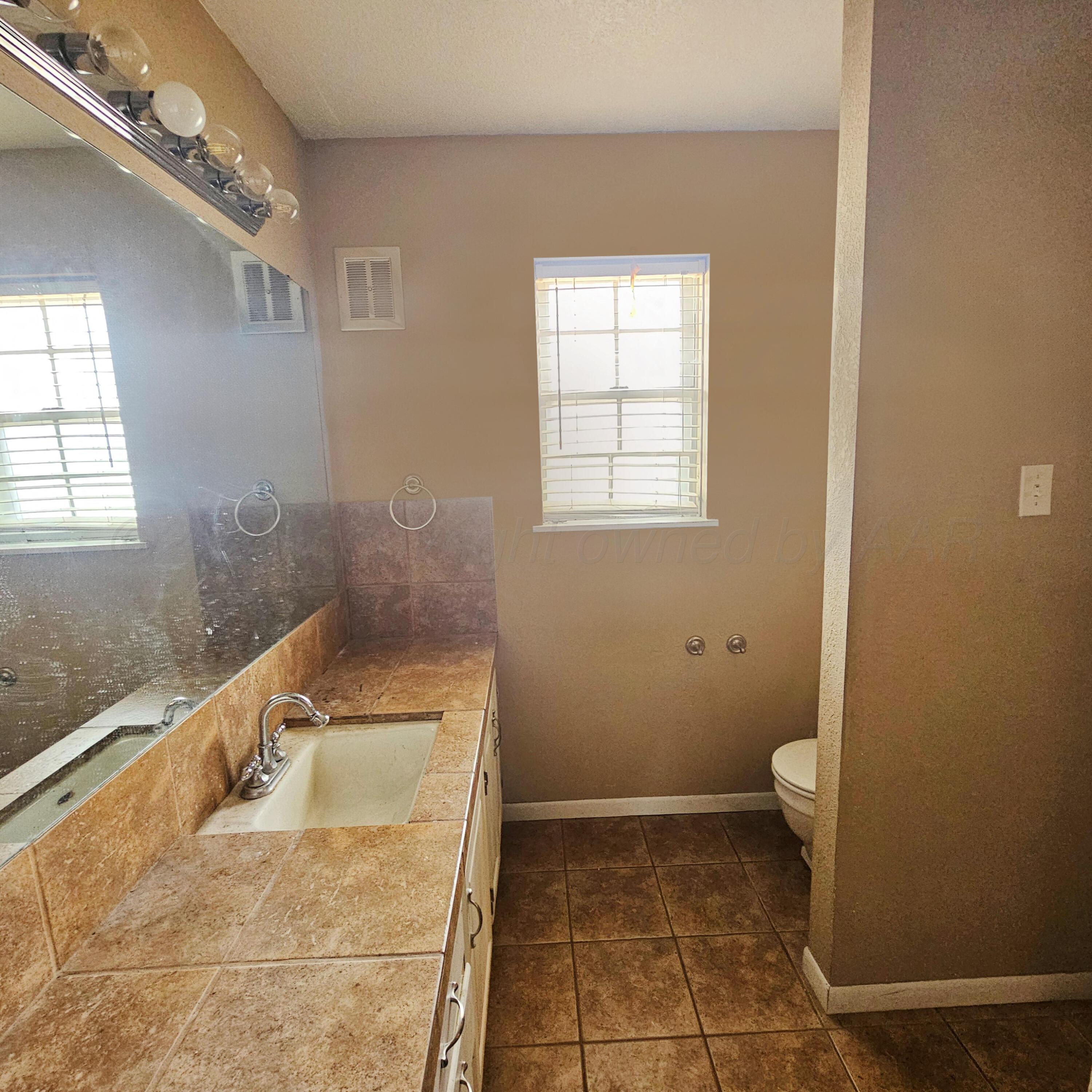 116 Bailey Avenue Dumas, TX 79029 - Photo 12 of 29 20260225_122845