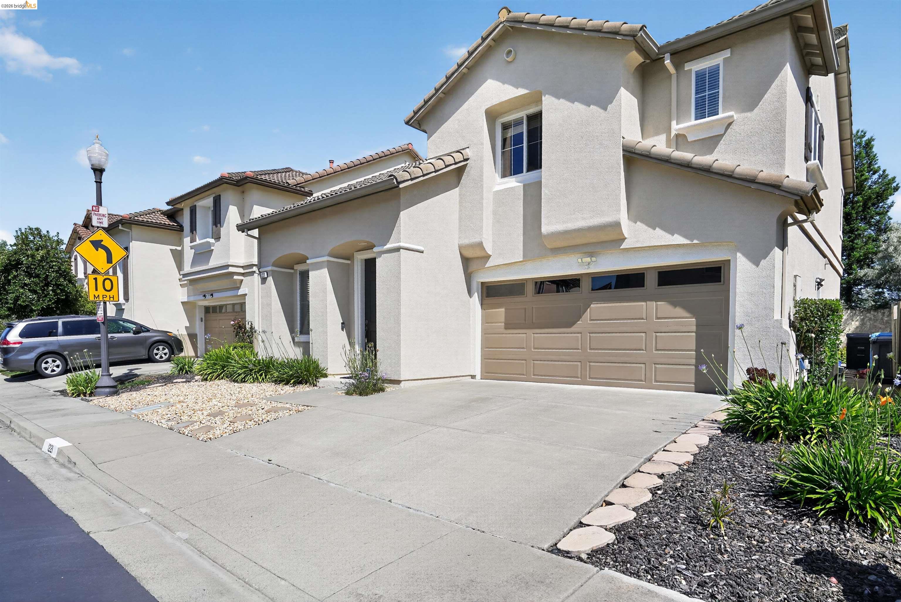 1221 Andrea Way Vallejo, CA 94591 - Photo 2 of 29 Stucco exterior with a tile roof