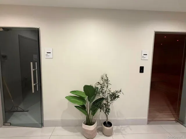 hallway with sliding door and entryway in a room