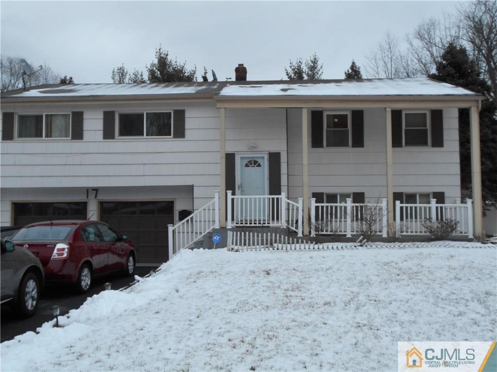 17 Kingsbridge Road Somerset, NJ 08873 - Photo 1 of 11 a view of house with deck and yard