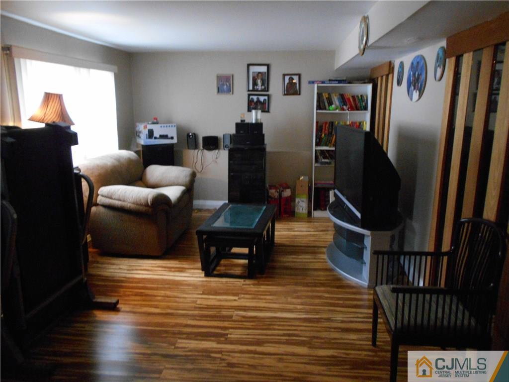 17 Kingsbridge Road Somerset, NJ 08873 - Photo 8 of 11 a living room with furniture
