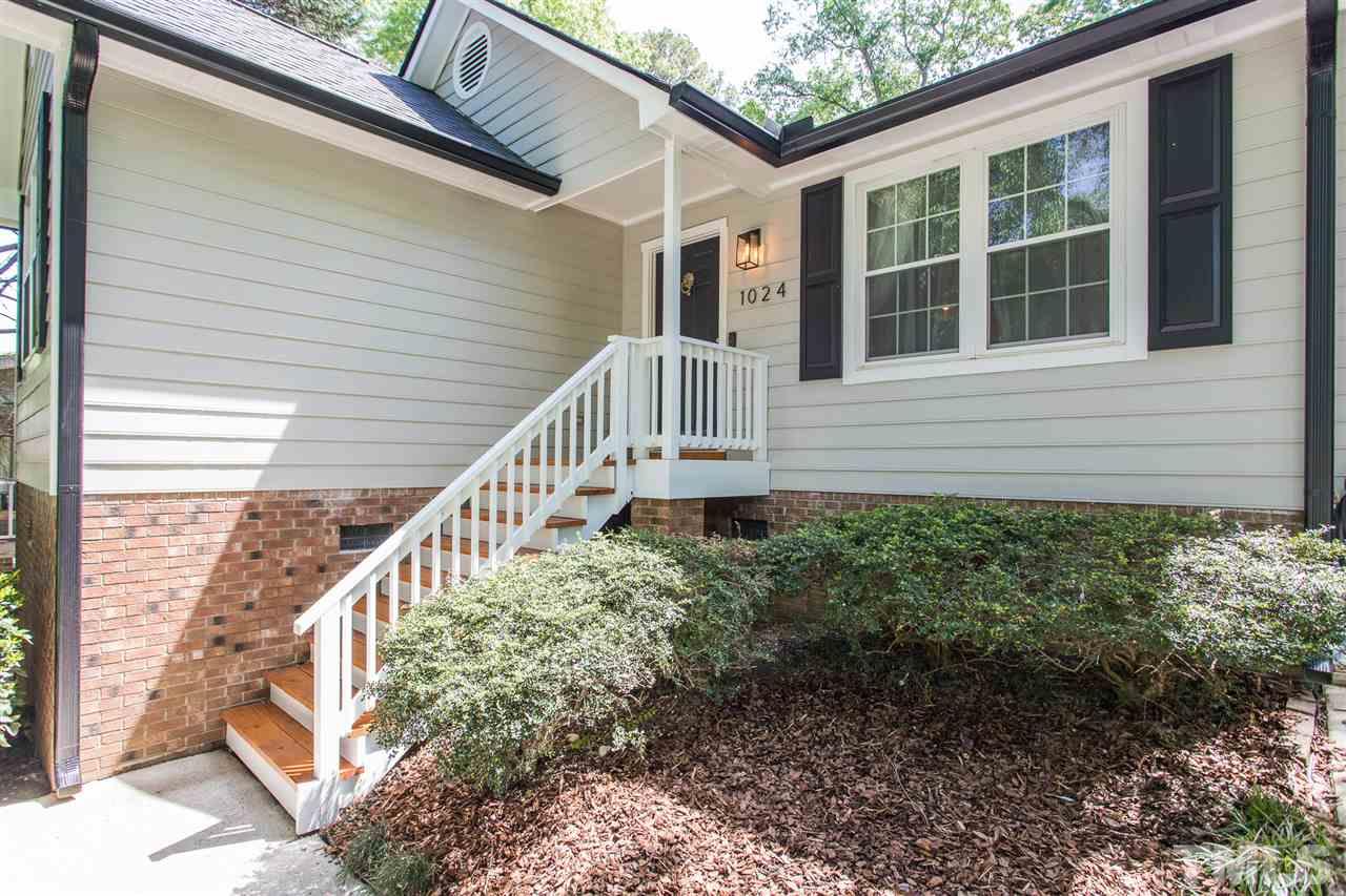 1024 Mills Street Raleigh, NC 27608 - Photo 3 of 30 a view of a house with a yard