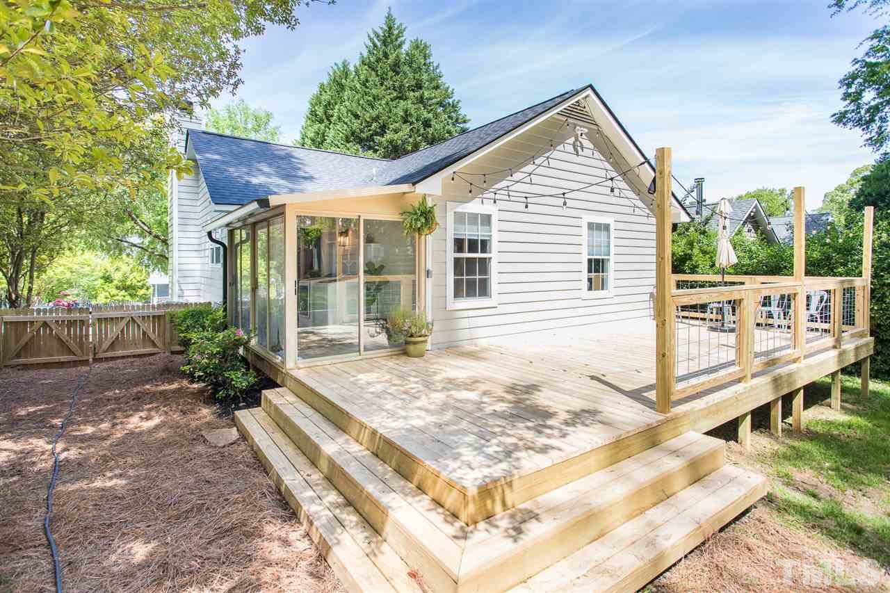 1024 Mills Street Raleigh, NC 27608 - Photo 24 of 30 a front view of a house with a yard