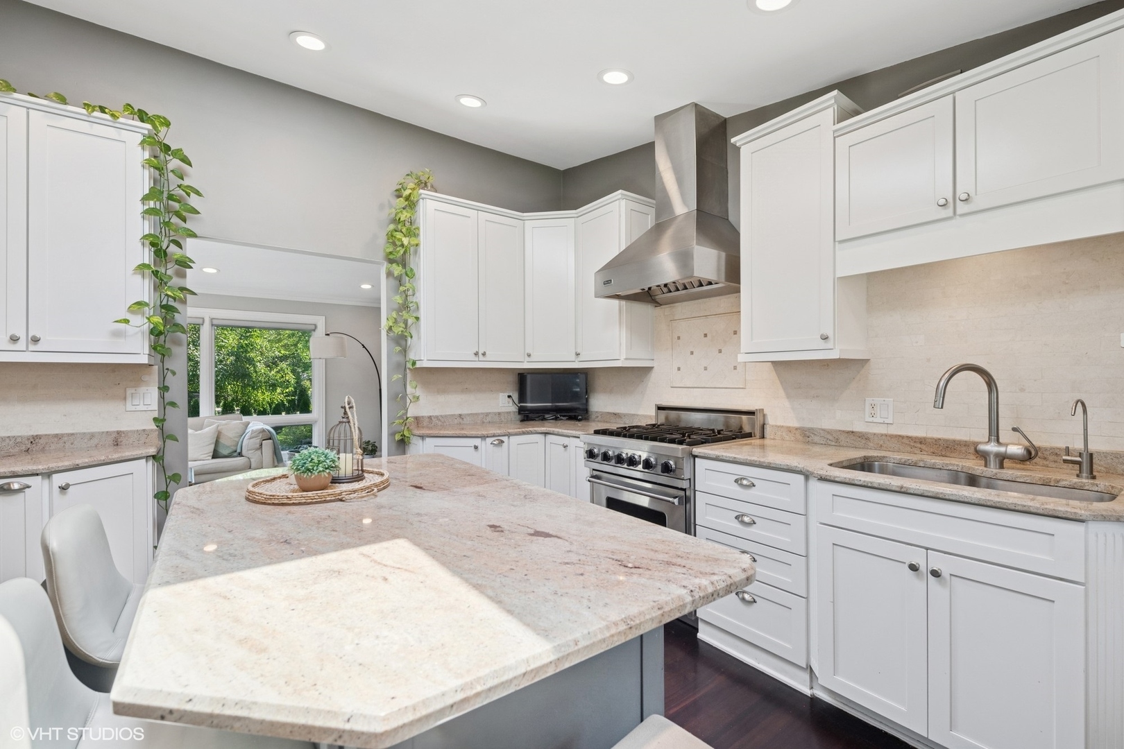 551 Dundee Road Glencoe, IL 60022 - Photo 11 of 38 a kitchen with stainless steel appliances granite countertop a sink stove and cabinets