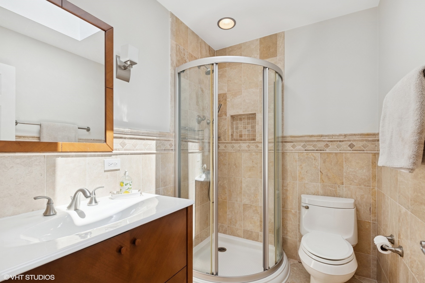 551 Dundee Road Glencoe, IL 60022 - Photo 22 of 38 a bathroom with a sink toilet and shower