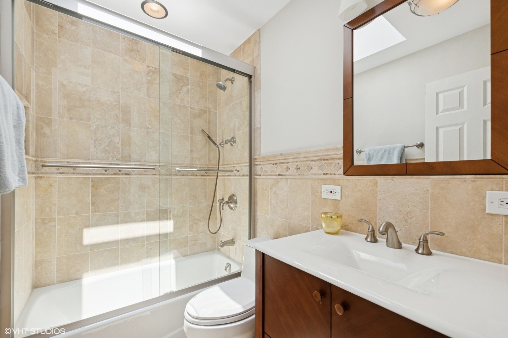 551 Dundee Road Glencoe, IL 60022 - Photo 25 of 38 a bathroom with a sink a toilet and shower