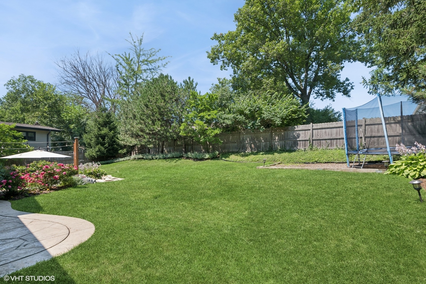 551 Dundee Road Glencoe, IL 60022 - Photo 33 of 38 a view of a chair and table in the garden