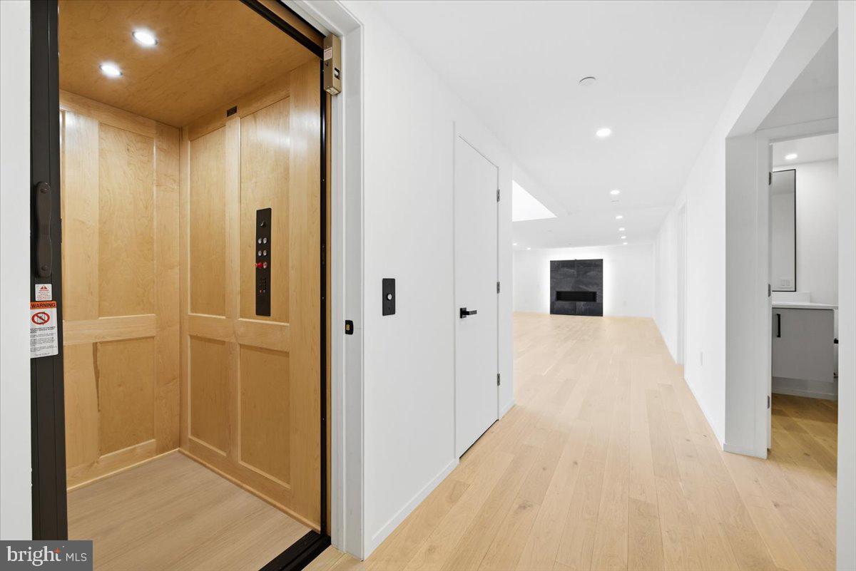 7502 Nevis Road Bethesda, MD 20817 - Photo 58 of 79 VIEW TO THE RECREATION AREA FROM ELEVATOR