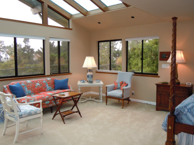 3059 Aztec Road Pebble Beach, CA 93953 - Photo 18 of 24 a living room with furniture and a large window