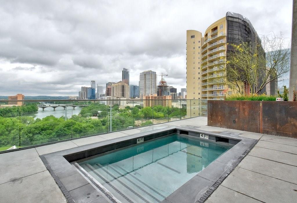 70 Rainey Street, Unit 1409 Austin, TX 78701 - Photo 34 of 38 View of swimming pool with patio surround and a skyline view