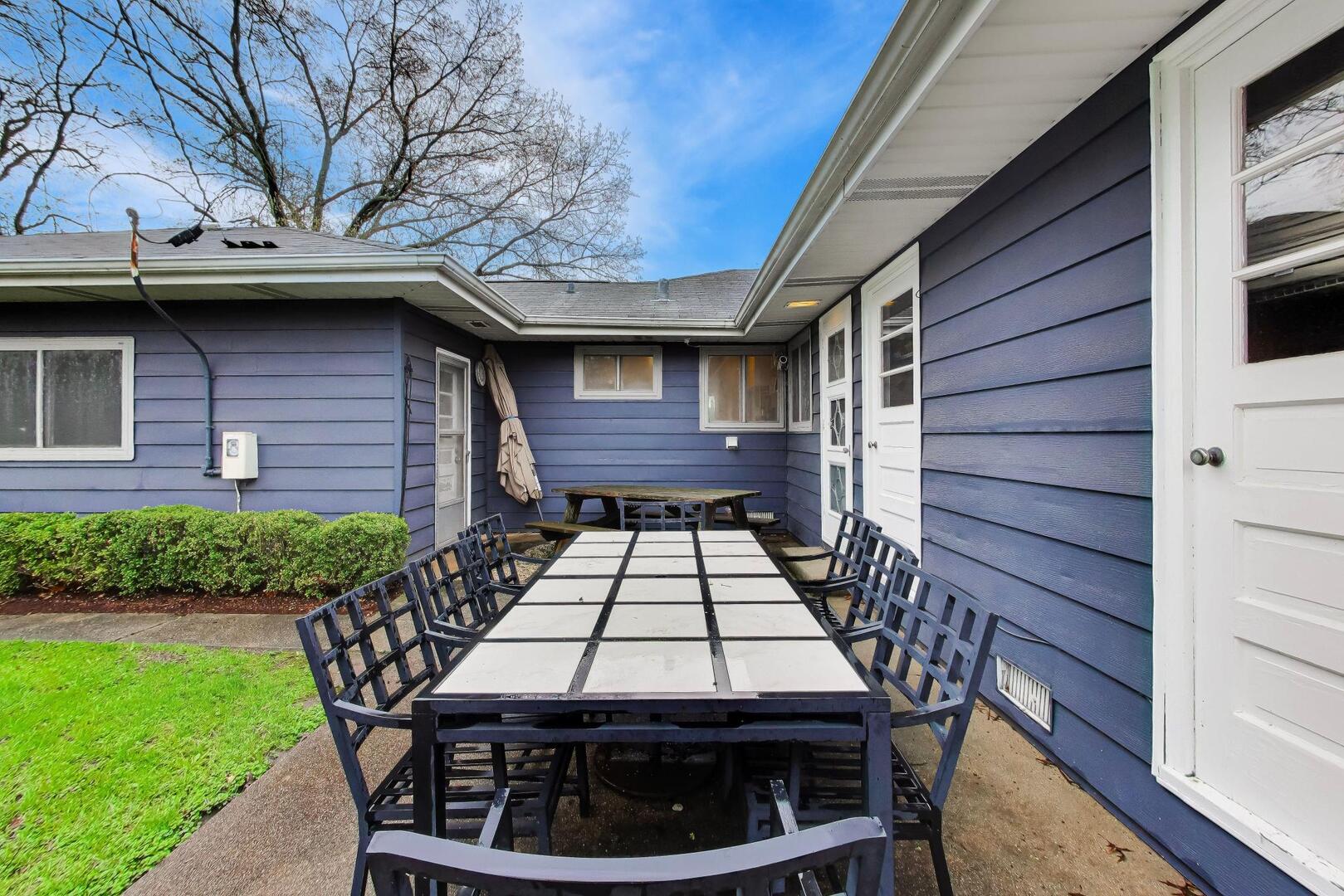 202 Grove Place Prospect Heights, IL 60070 - Photo 29 of 34 a view of a patio with a table chairs and wooden fence