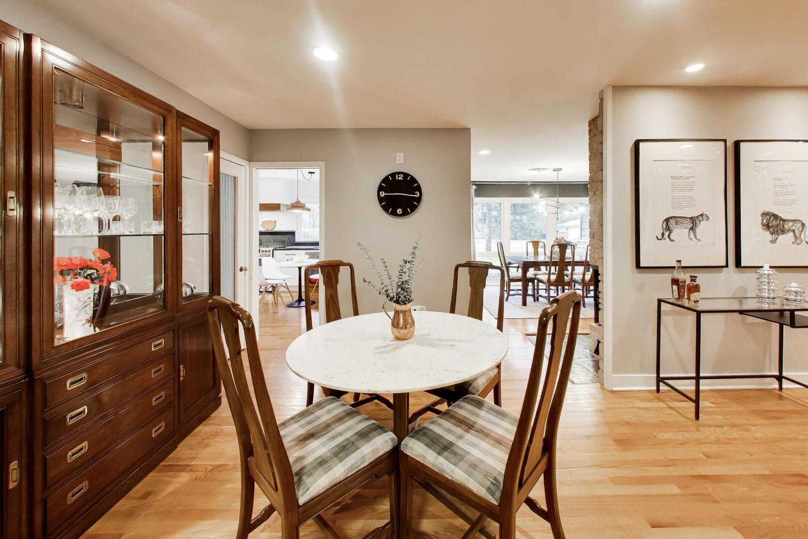 202 Grove Place Prospect Heights, IL 60070 - Photo 9 of 34 a view of a dining room with furniture and wooden floor