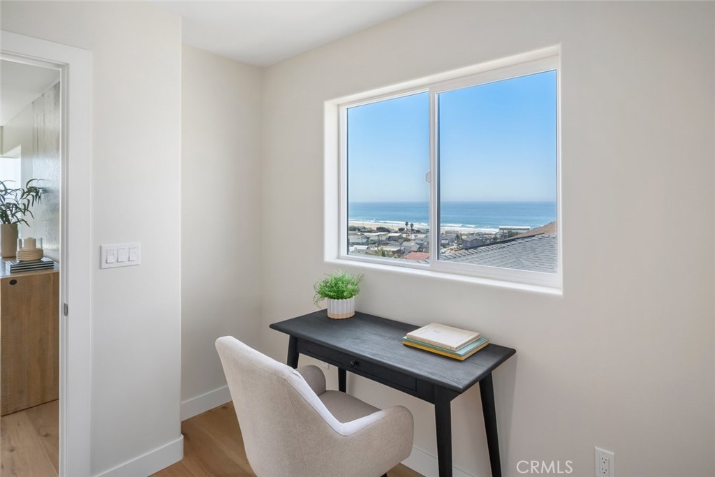 548 Blanca Street Morro Bay, CA 93442 - Photo 20 of 50 a view of a room that has a table and chairs in it