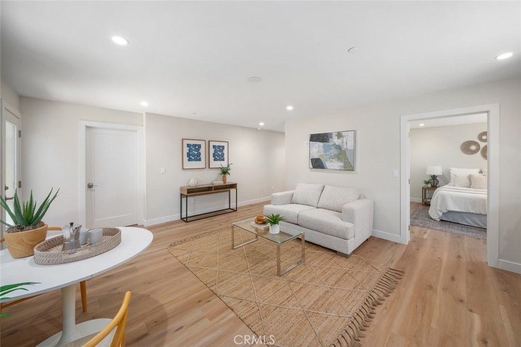 548 Blanca Street Morro Bay, CA 93442 - Photo 37 of 50 a living room with furniture and wooden floor