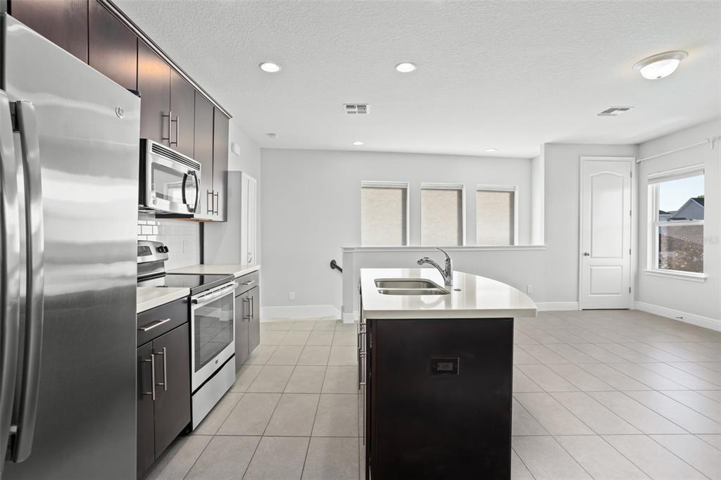 13590 Lessing Avenue Orlando, FL 32827 - Photo 9 of 45