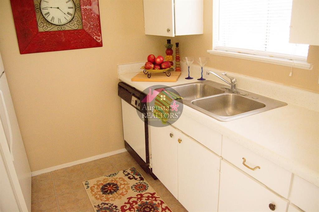 2800 Sayles Boulevard, Unit 19B Abilene, TX 79605 - Photo 11 of 12 a bathroom with a sink and a window