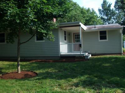 106 Seabrook Road Hyannis, MA 02601 - Photo 2 of 10 a view of a house with a backyard