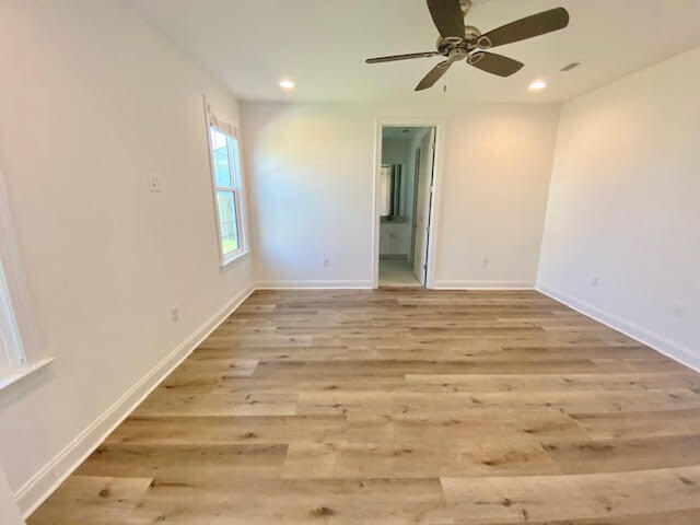 25 Cambium Ct Inlet Beach Inlet Beach, FL 32461 - Photo 12 of 29 a view of an empty room and wooden floor