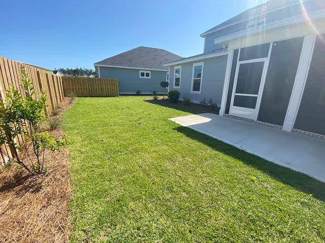 25 Cambium Ct Inlet Beach Inlet Beach, FL 32461 - Photo 17 of 29 a front view of a house with a yard and garage