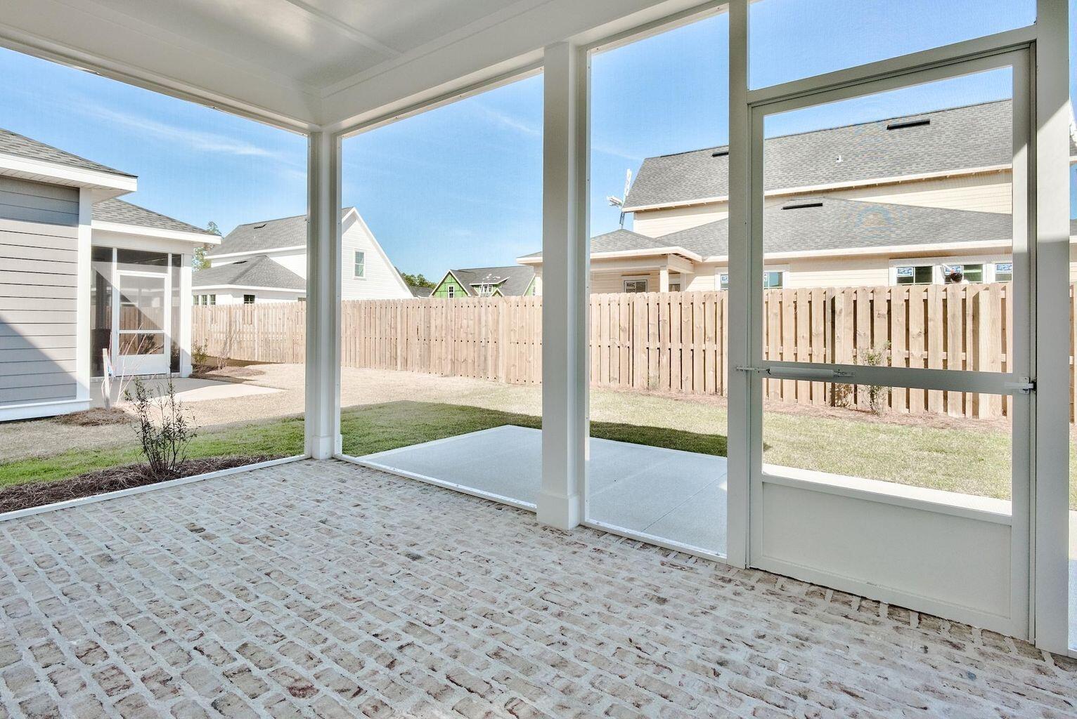 25 Cambium Ct Inlet Beach Inlet Beach, FL 32461 - Photo 27 of 29 a view of a porch with a floor to ceiling window