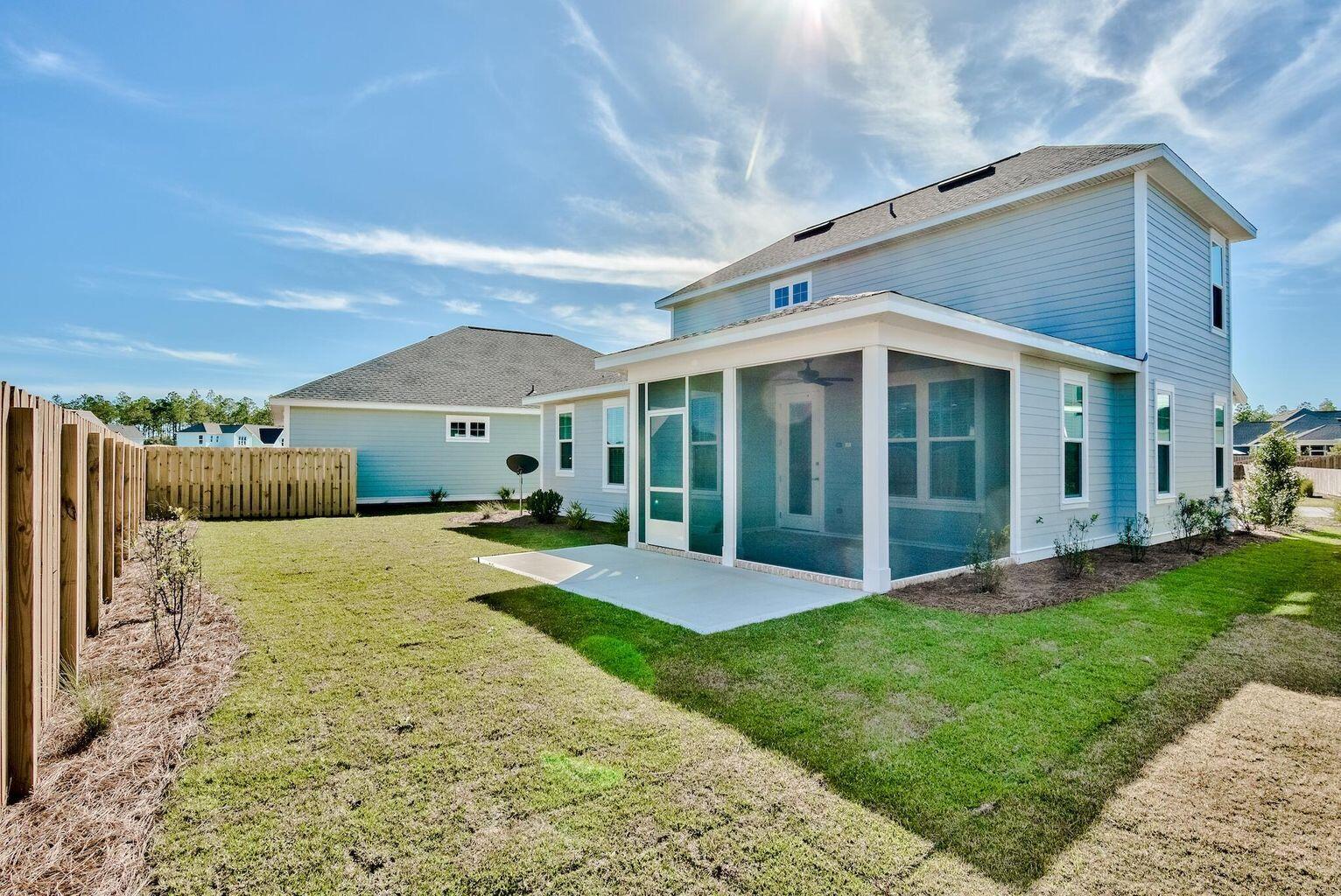 25 Cambium Ct Inlet Beach Inlet Beach, FL 32461 - Photo 28 of 29 a view of a house with backyard and porch