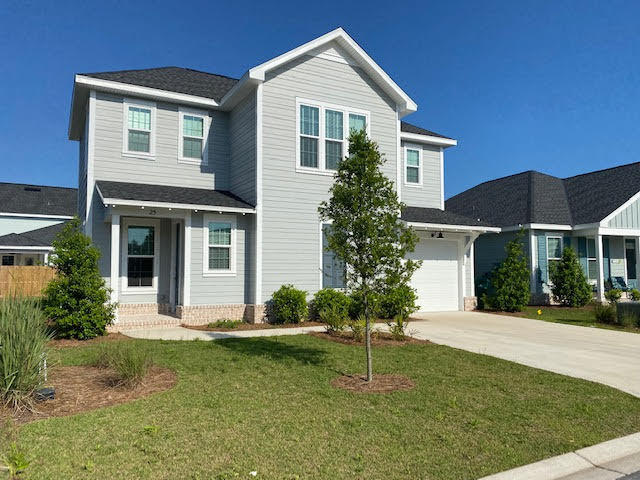 25 Cambium Ct Inlet Beach Inlet Beach, FL 32461 - Photo 3 of 29 a front view of a house with a yard