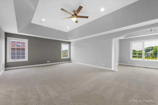 a bathroom with a shower sink vanity and mirror