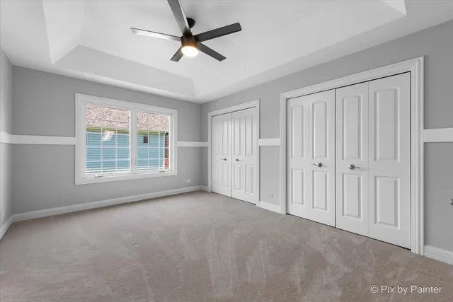 an aerial view of a house with outdoor space