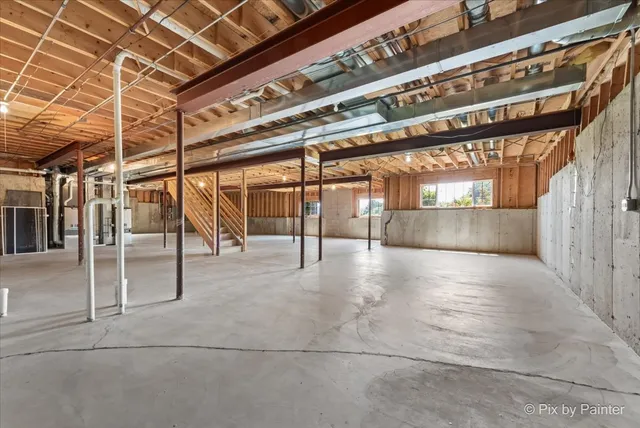 an aerial view of a house with garden space