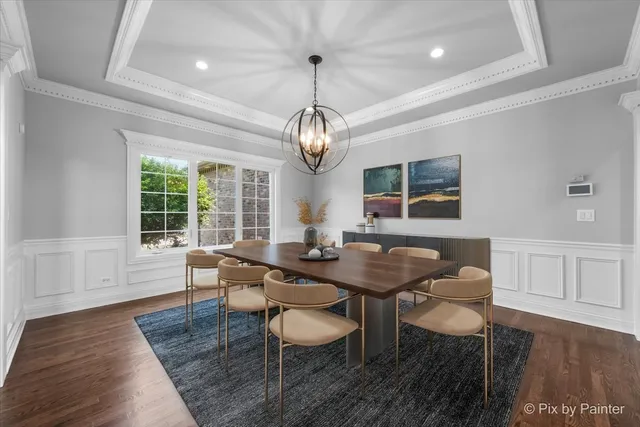 a view of a livingroom with wooden floor