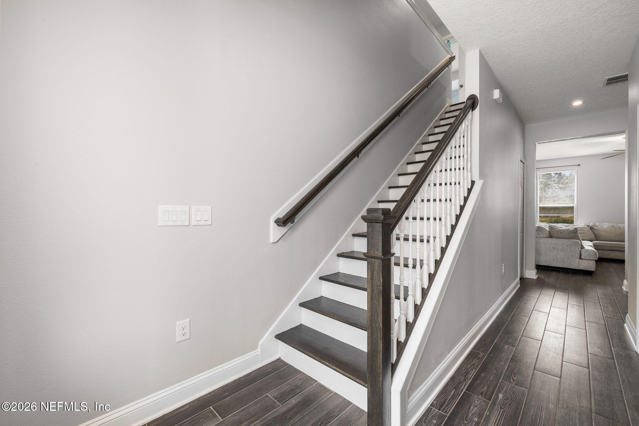 28 Focal Court St. Augustine, FL 32095 - Photo 20 of 54 a view of staircase with wooden floor and white walls