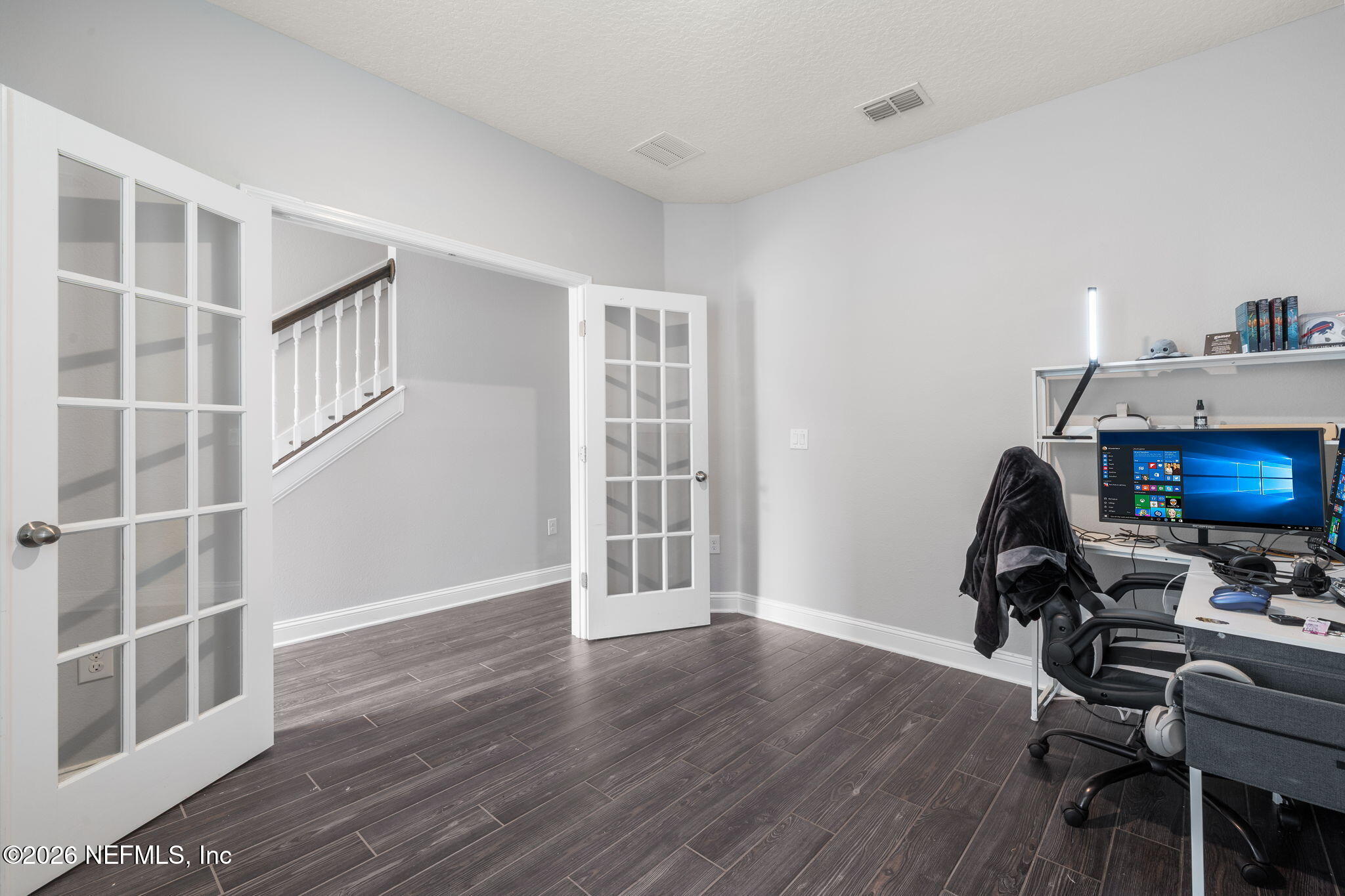 28 Focal Court St. Augustine, FL 32095 - Photo 22 of 54 a view of furniture and wooden floor in a room