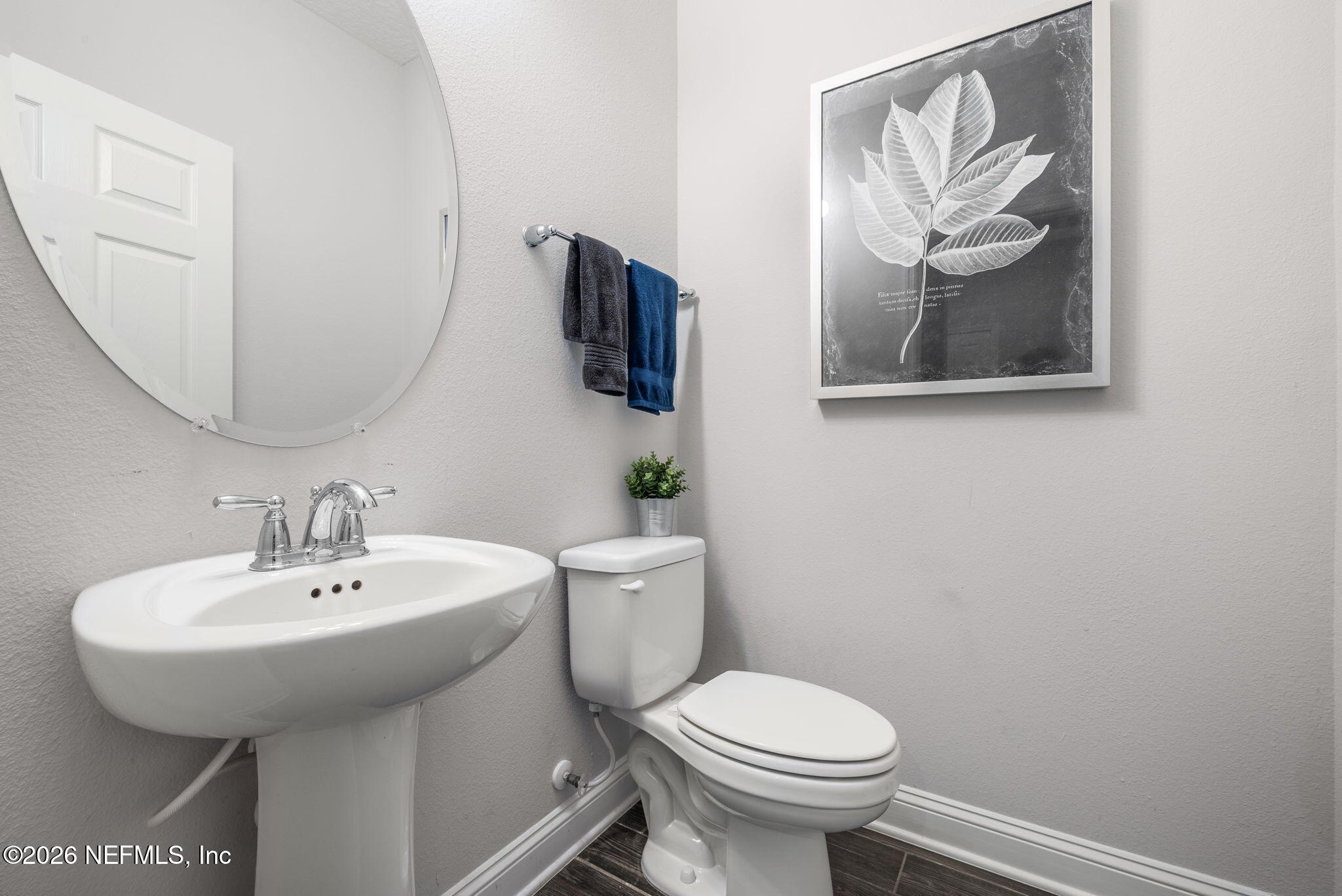 28 Focal Court St. Augustine, FL 32095 - Photo 24 of 54 a bathroom with a toilet sink and mirror
