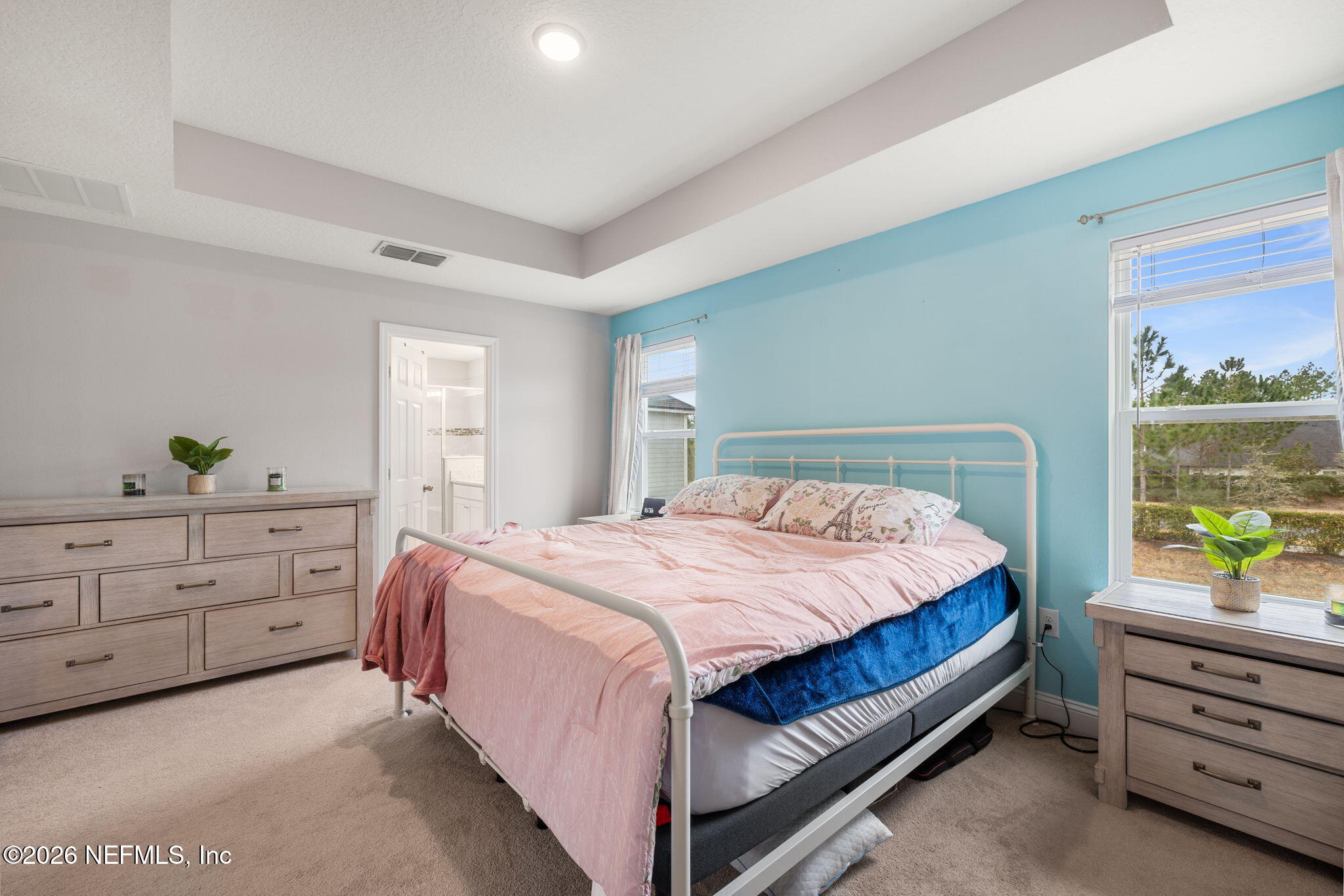 28 Focal Court St. Augustine, FL 32095 - Photo 29 of 54 a bedroom with a bed and a dresser