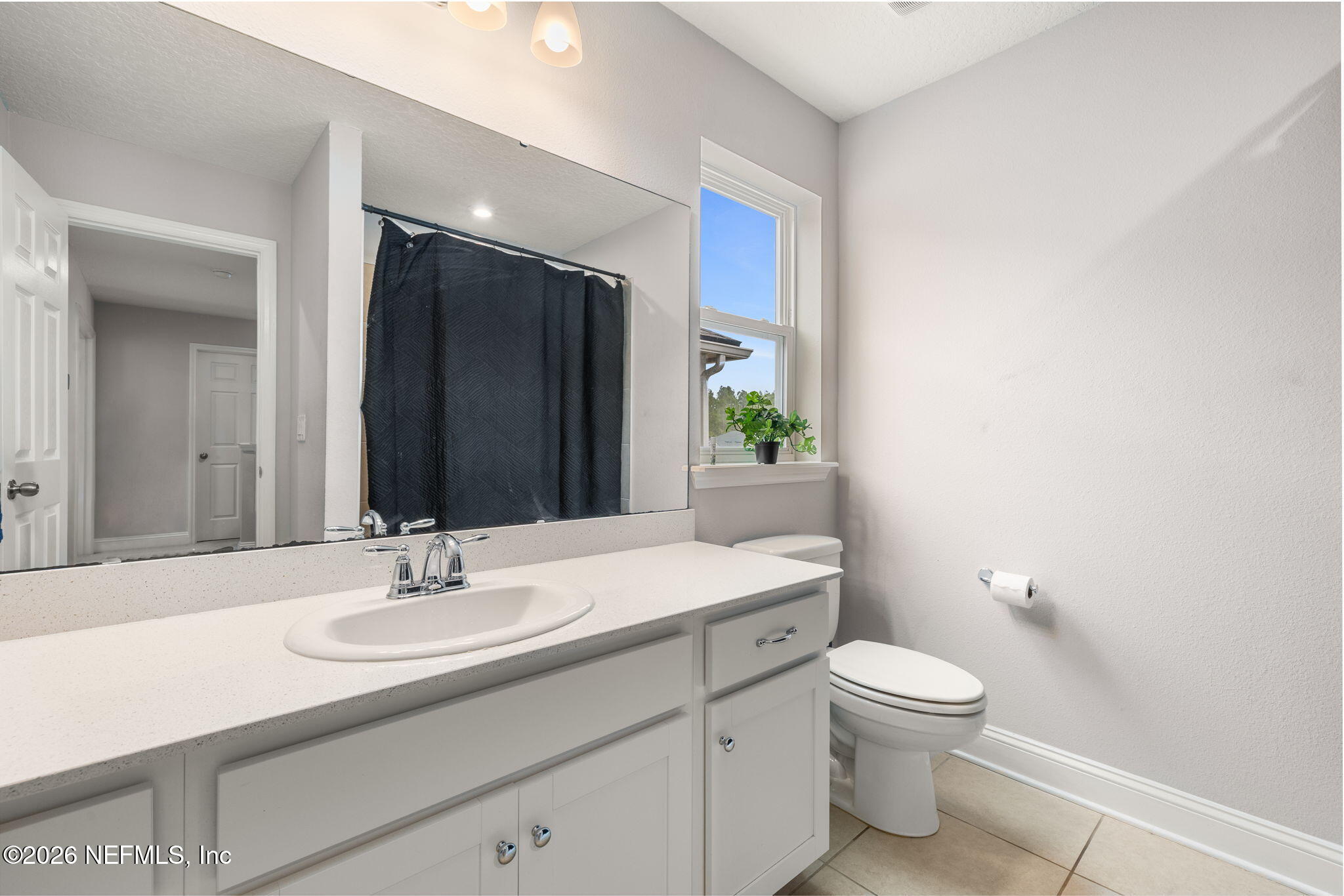28 Focal Court St. Augustine, FL 32095 - Photo 35 of 54 a bathroom with a sink toilet and vanity