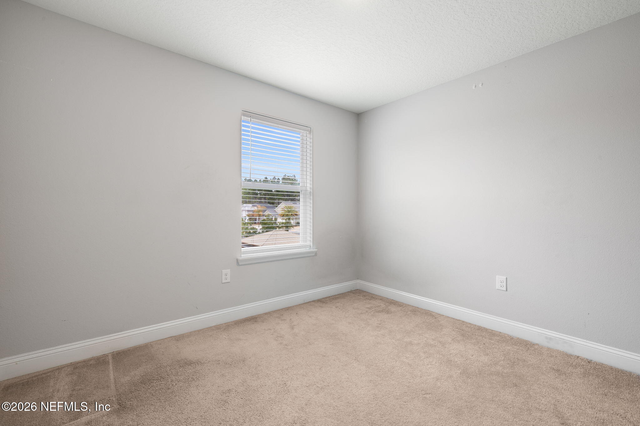 28 Focal Court St. Augustine, FL 32095 - Photo 36 of 54 an empty room with a window