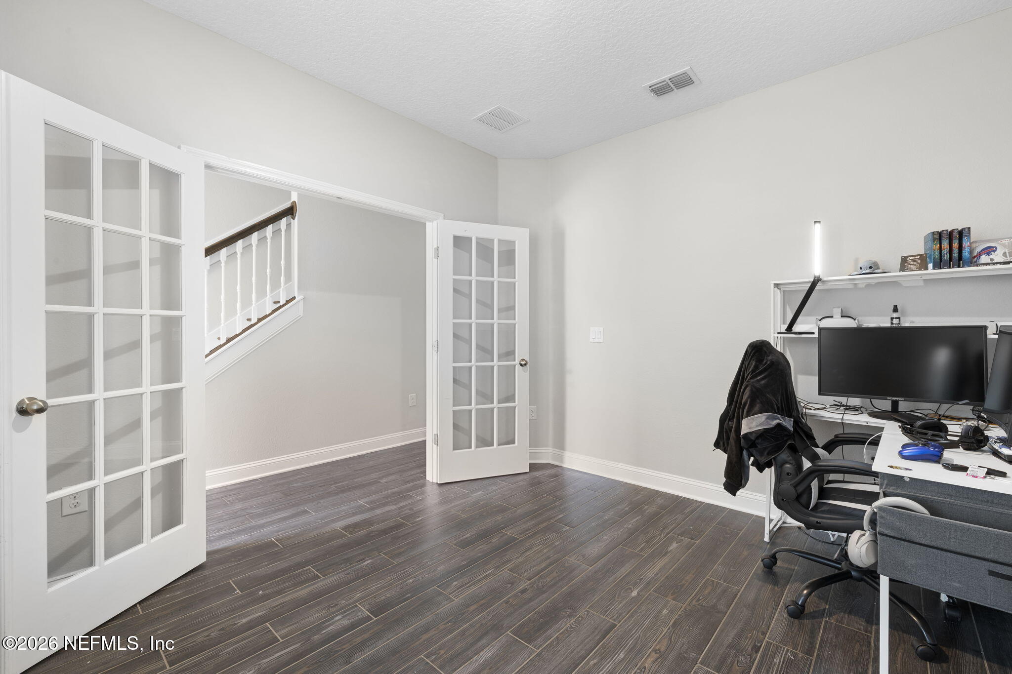 28 Focal Court St. Augustine, FL 32095 - Photo 42 of 54 workspace with wooden floor and windows