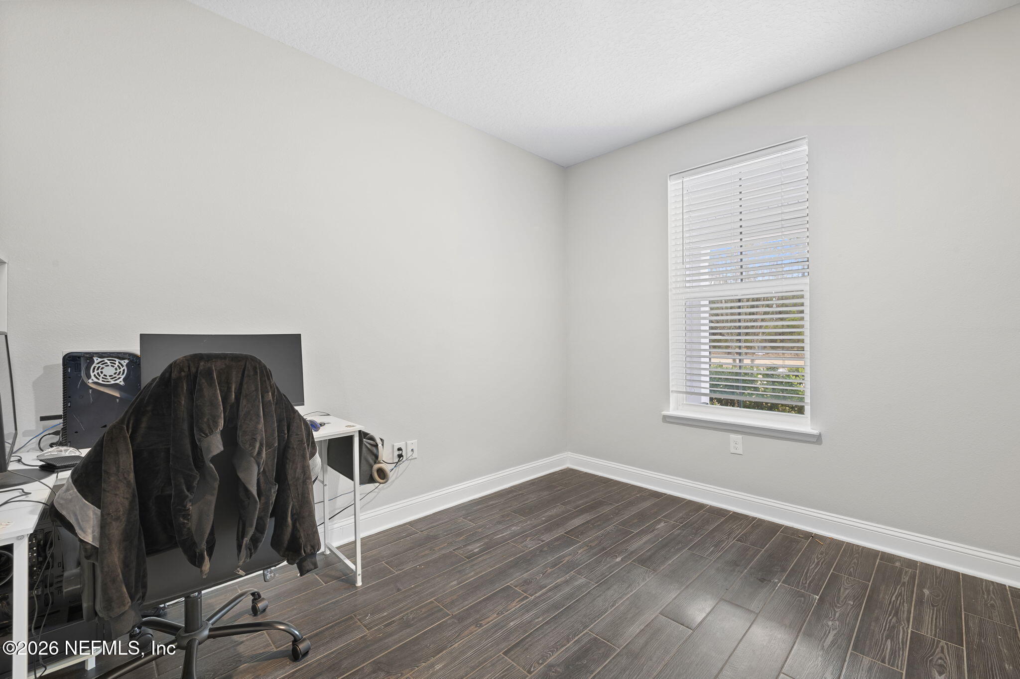 28 Focal Court St. Augustine, FL 32095 - Photo 44 of 54 a view of a workspace with furniture and a window