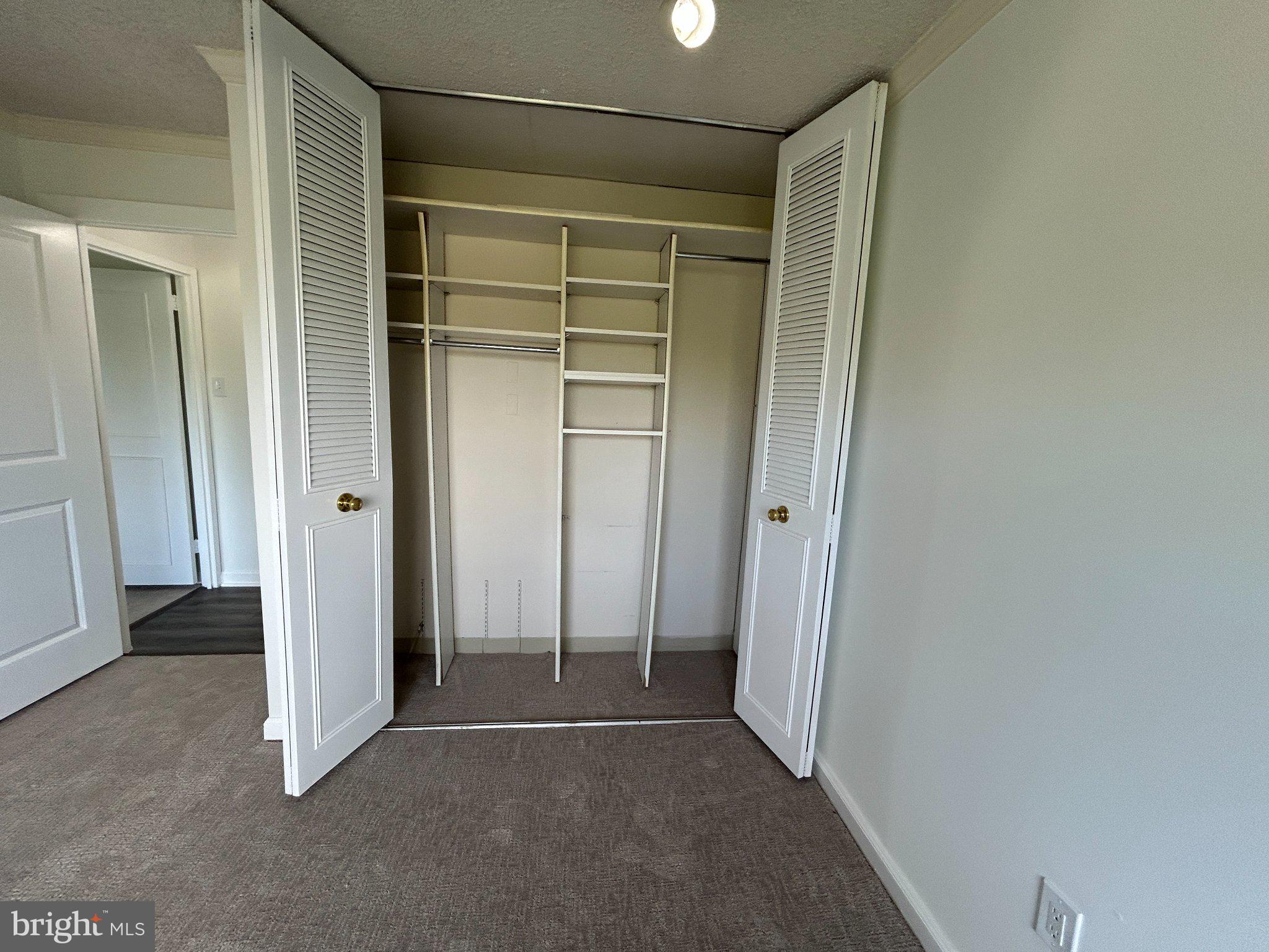 860 Lower Ferry Road, Unit 6M Ewing, NJ 08628 - Photo 11 of 16 an empty room with closet