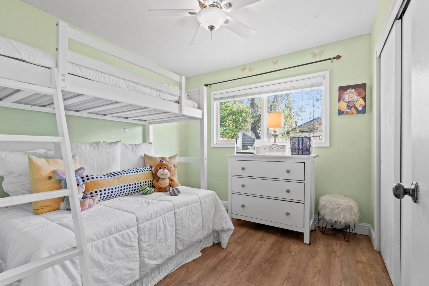 1706 Ayers Road Concord, CA 94521 - Photo 14 of 60 a bedroom with a bed and large windows