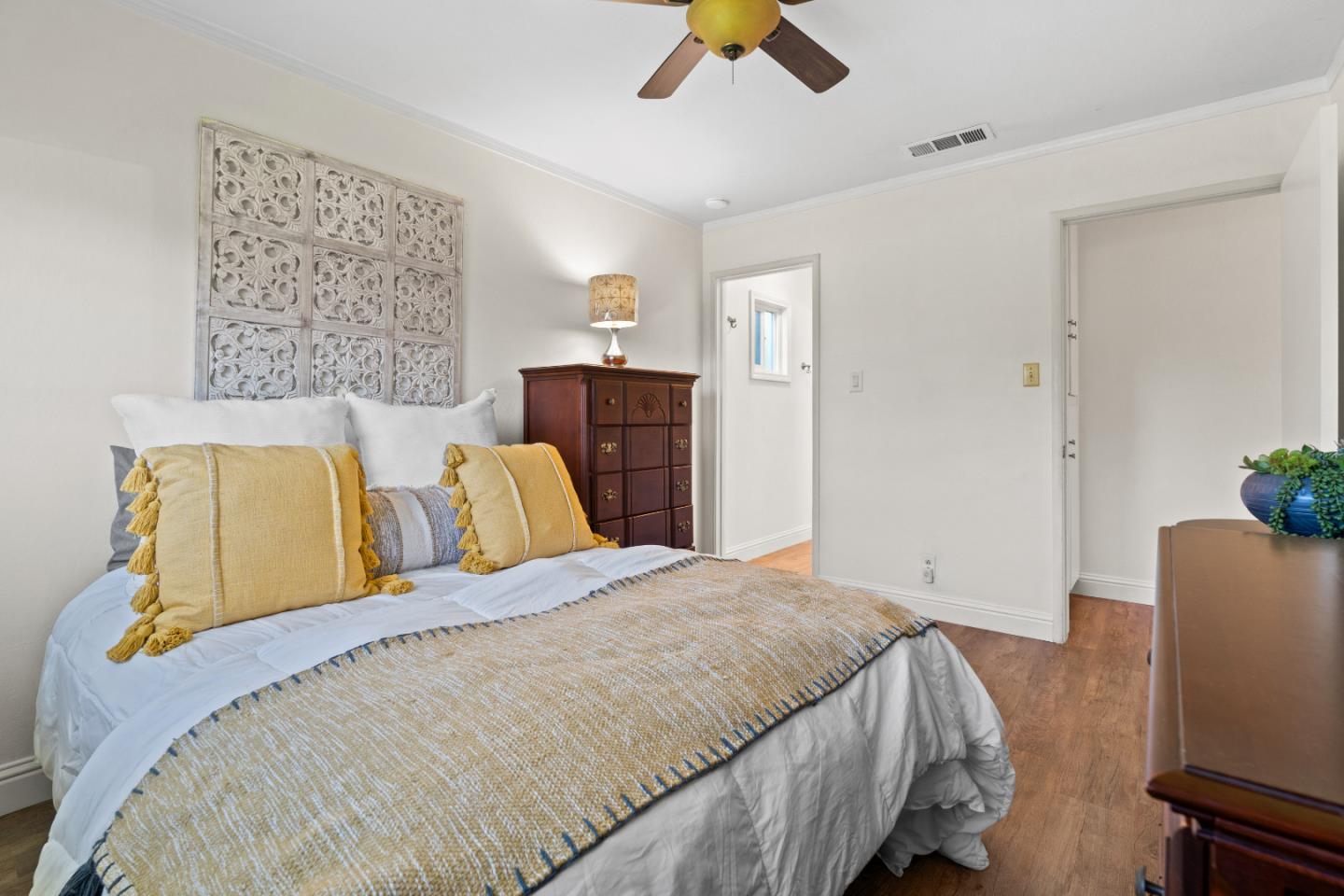 1706 Ayers Road Concord, CA 94521 - Photo 17 of 60 a bedroom with a bed and painting on the wall